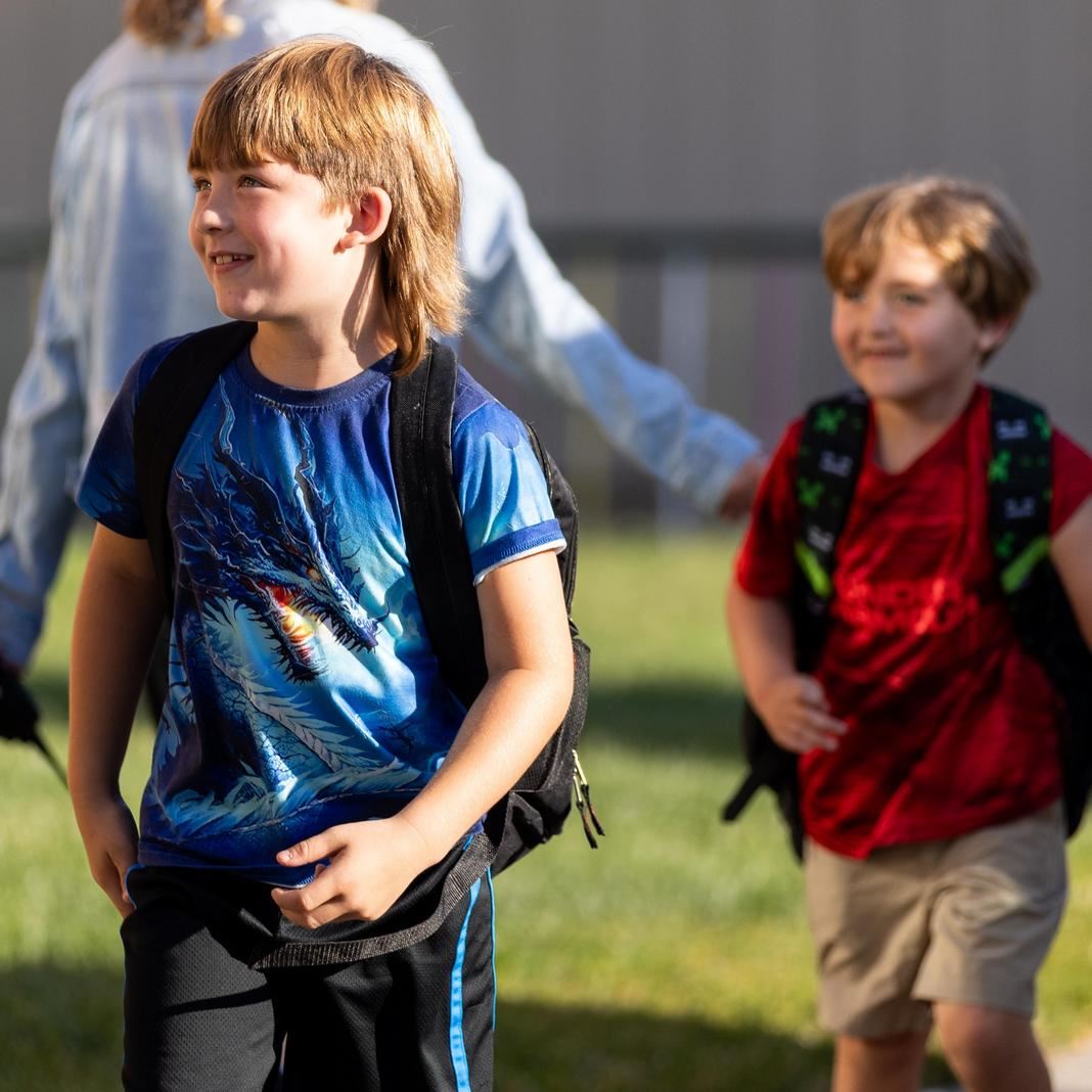  Students walk up to their school building